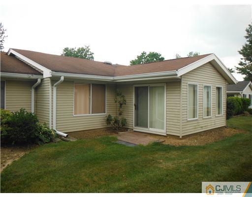 804 Pompton Road Monroe Township, NJ 08831 - Photo 4 of 12 a view of a house with a yard