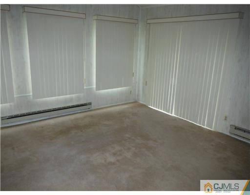 804 Pompton Road Monroe Township, NJ 08831 - Photo 6 of 12 a view of an empty room
