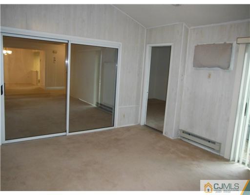 804 Pompton Road Monroe Township, NJ 08831 - Photo 7 of 12 a view of an empty room