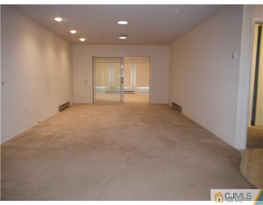 804 Pompton Road Monroe Township, NJ 08831 - Photo 8 of 12 a view of an empty room