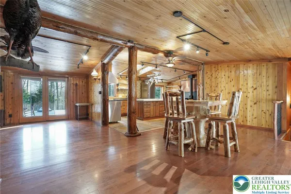 a view of a chairs and table in a room