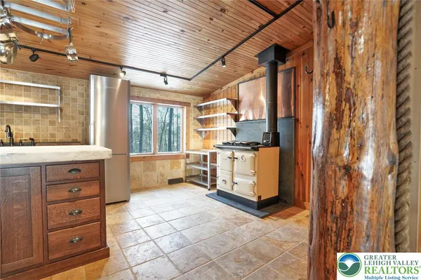 a kitchen with a stove and a microwave
