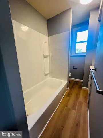 a bathroom with a tub