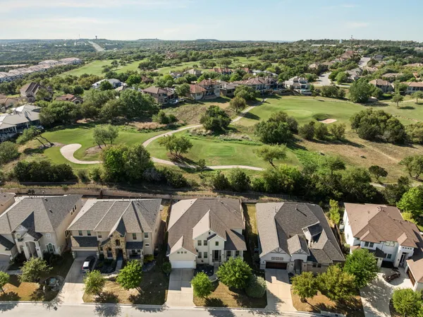 an aerial view of a house with a garden