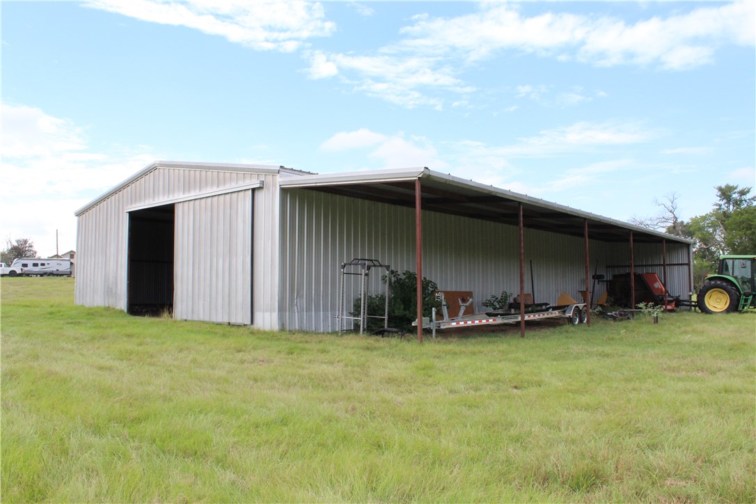 16601 County Road 467 Marquez, TX 77865 - Photo 2 of 38 View of pole building featuring a yard