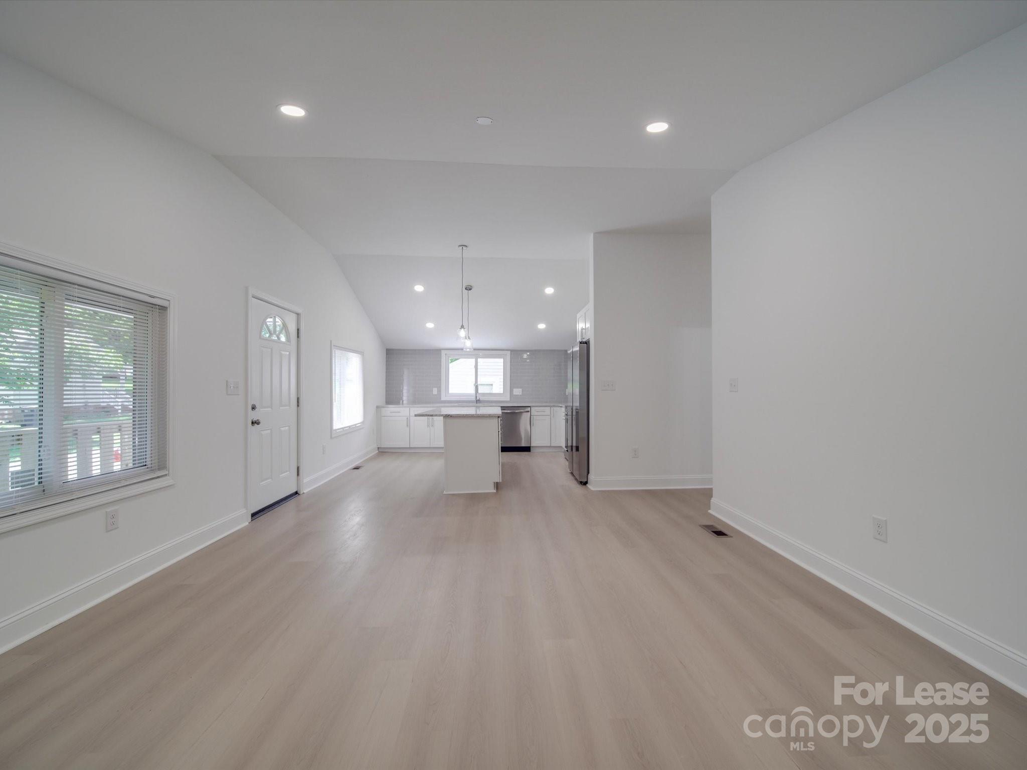1012 Wood Street Albemarle, NC 28001 - Photo 26 of 31 a view of empty room with a window and fireplace