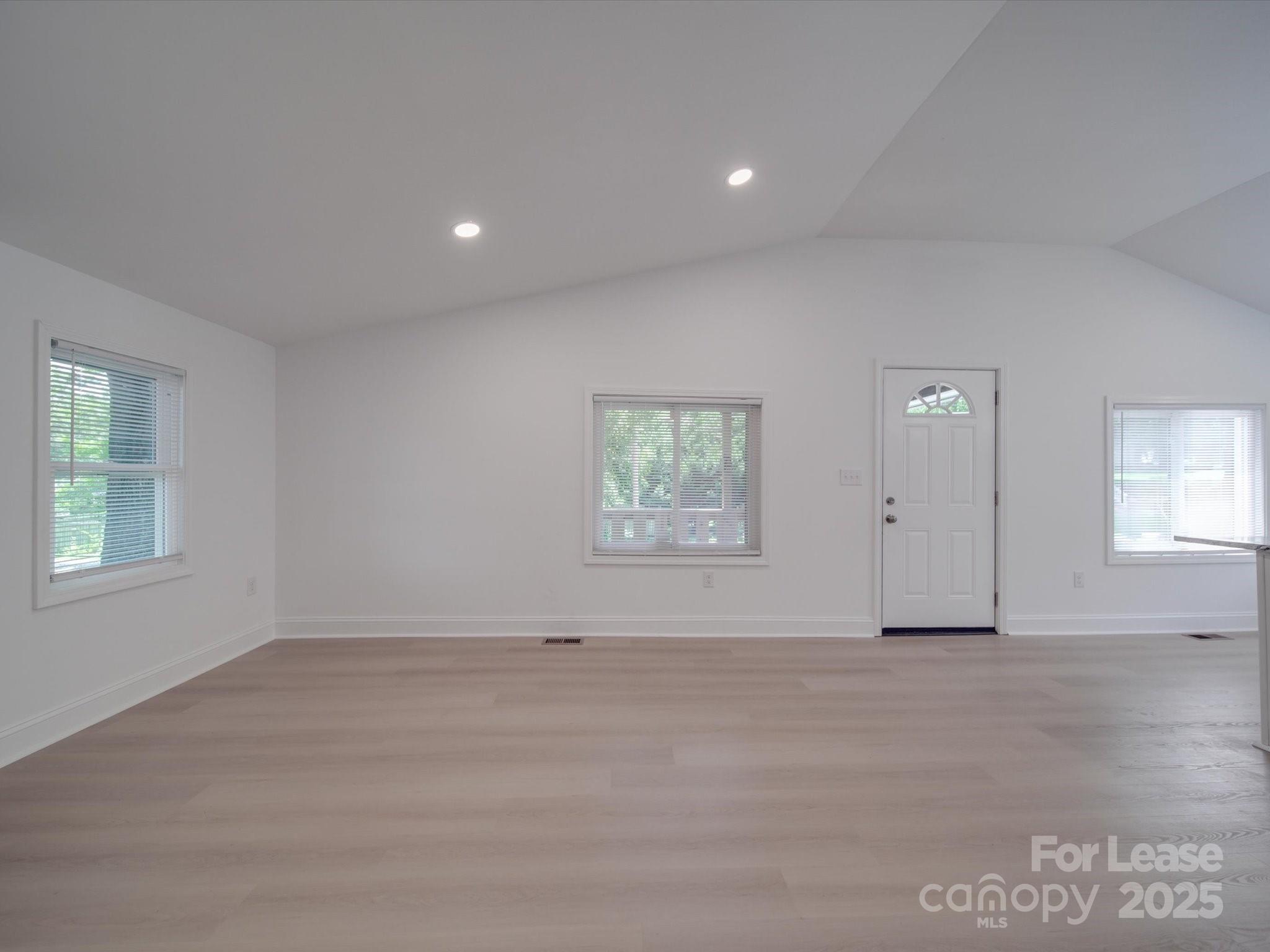 1012 Wood Street Albemarle, NC 28001 - Photo 28 of 31 an empty room with windows