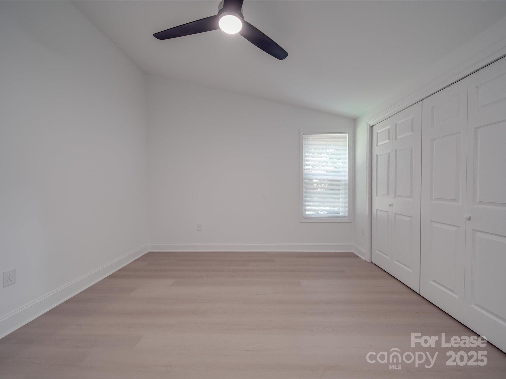 1012 Wood Street Albemarle, NC 28001 - Photo 9 of 31 an empty room with a empty space and windows