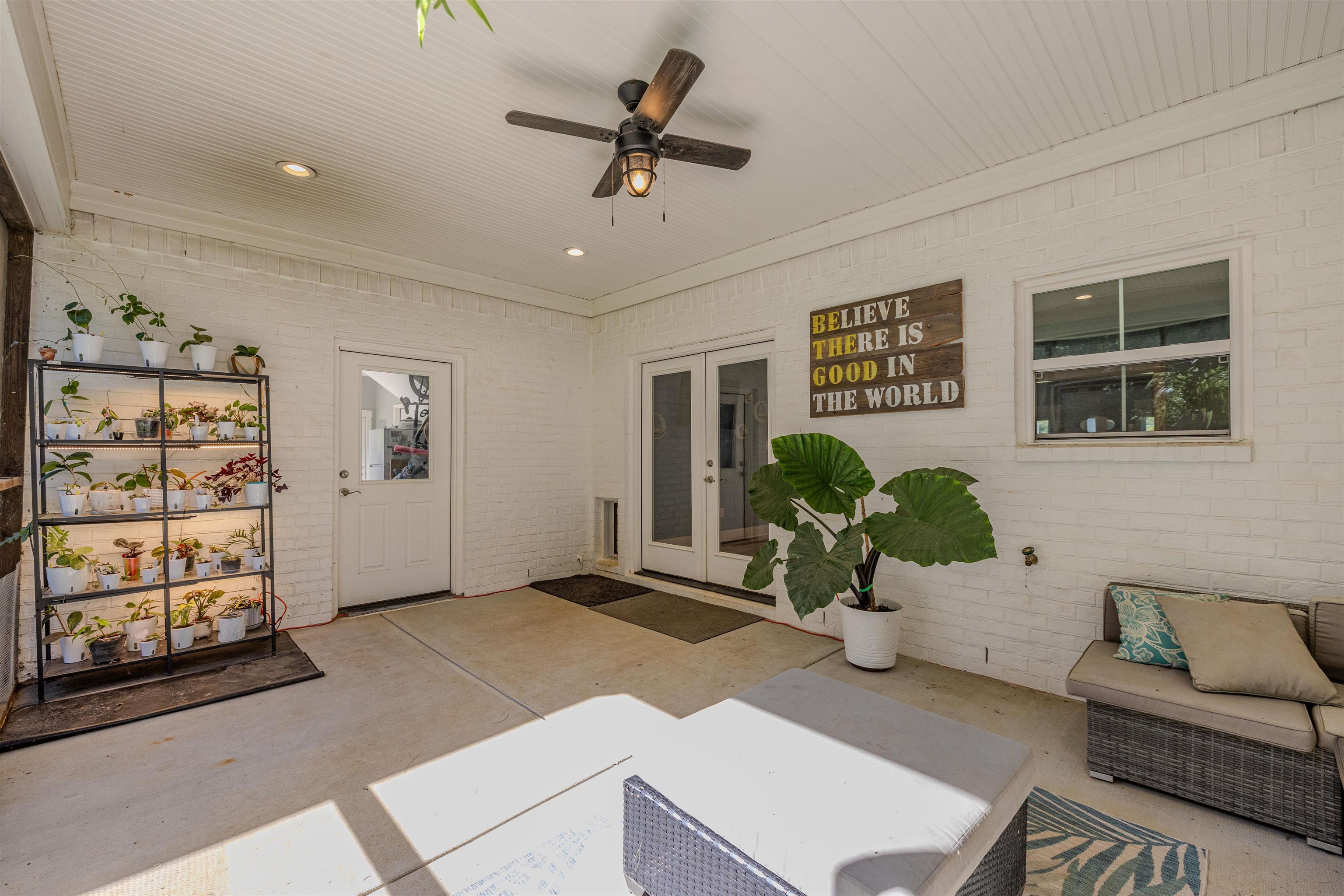 3090 Marshall Road Munford, TN 38058 - Photo 14 of 27 View of patio / terrace featuring french doors, ceiling fan, and outdoor furniture