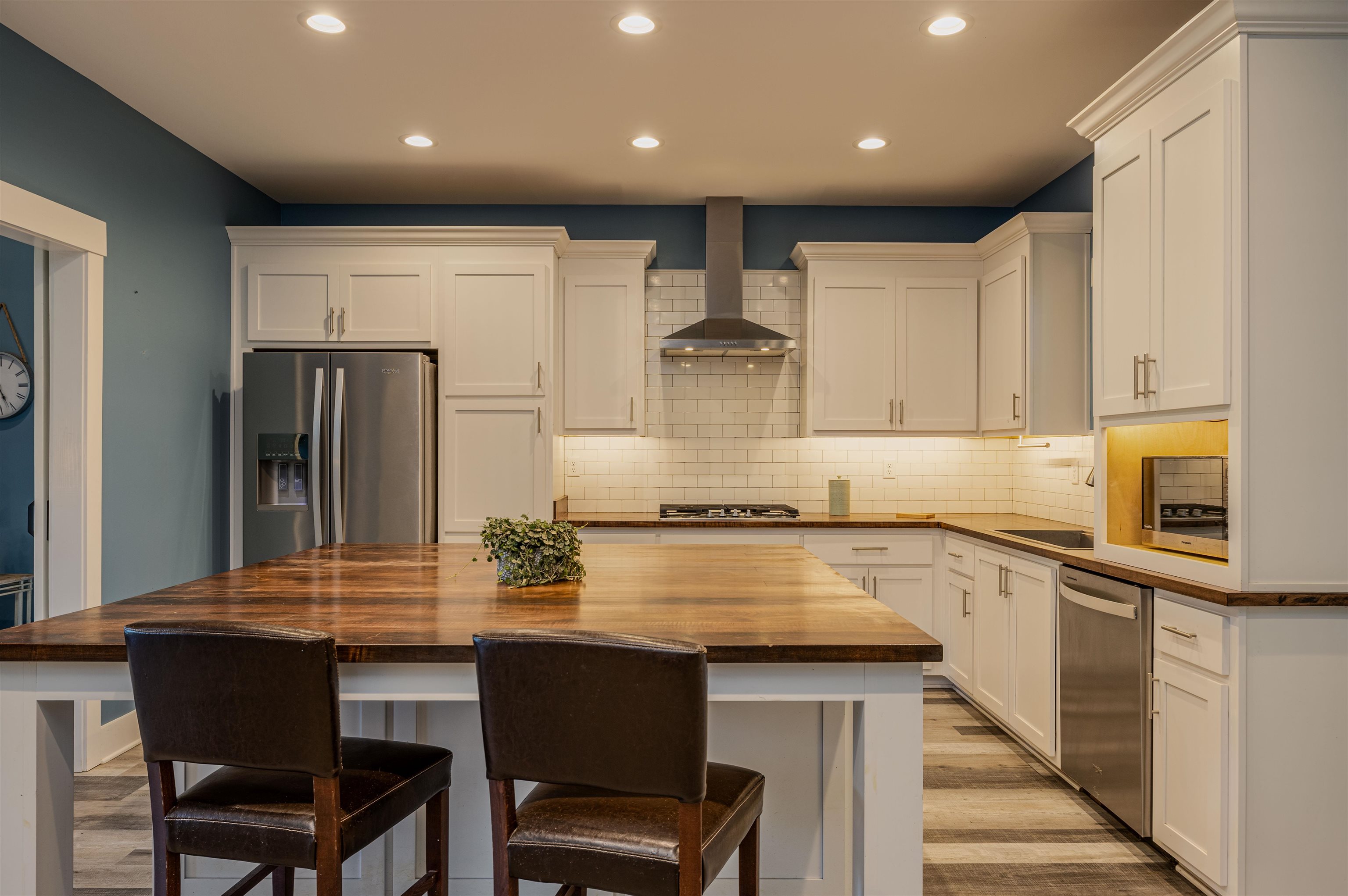 3090 Marshall Road Munford, TN 38058 - Photo 9 of 27 a kitchen with stainless steel appliances granite countertop a kitchen island hardwood floor sink and stove