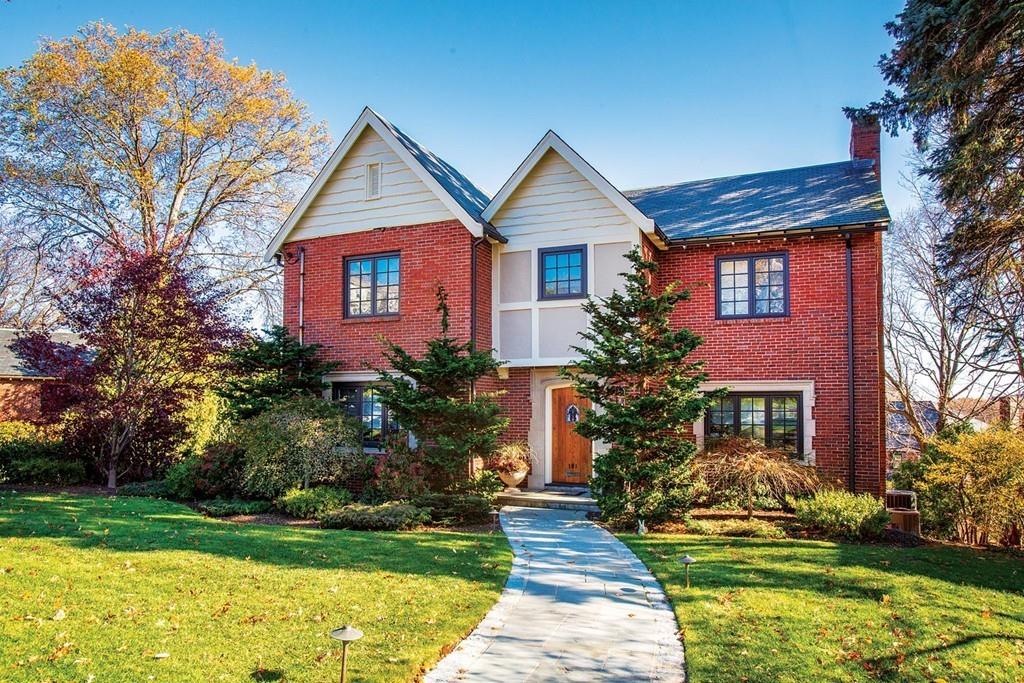 101 Blake Road Brookline, MA 02445 - Photo 1 of 28 a front view of a house with a yard