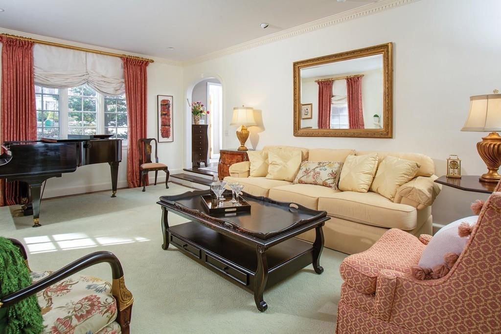 101 Blake Road Brookline, MA 02445 - Photo 14 of 28 a living room with furniture and a large window
