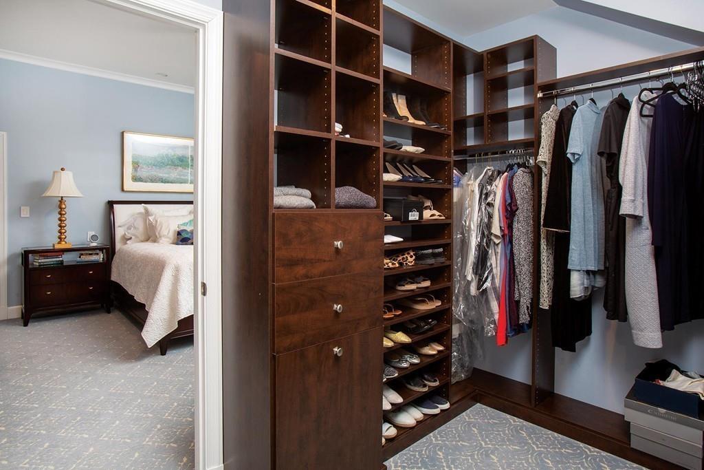 101 Blake Road Brookline, MA 02445 - Photo 17 of 28 a view of walk in closet with clothes and shoes