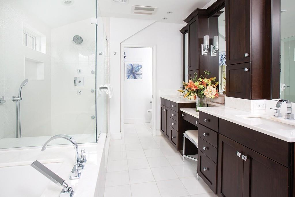 101 Blake Road Brookline, MA 02445 - Photo 18 of 28 a spacious bathroom with a double vanity sink mirror double and shower