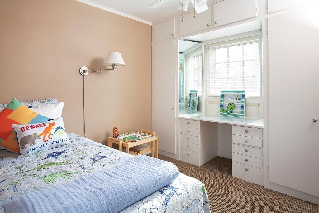 101 Blake Road Brookline, MA 02445 - Photo 21 of 28 a bedroom with a bed and a window