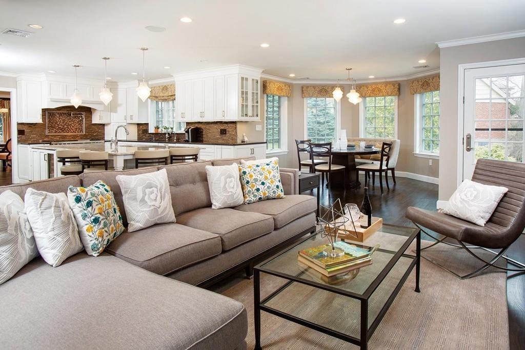 101 Blake Road Brookline, MA 02445 - Photo 5 of 28 a living room with furniture kitchen view and large windows