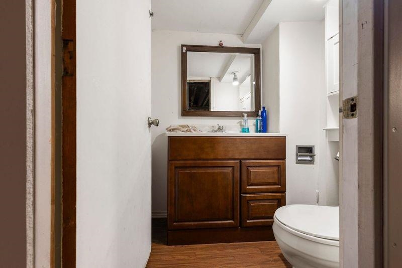 4893 Braewild Road Rockford, IL 61107 - Photo 16 of 21 a bathroom with a toilet sink and mirror