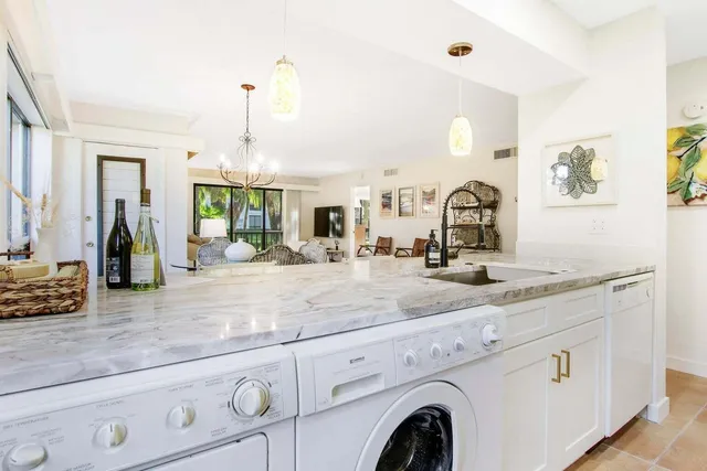 a view with sink and mirror