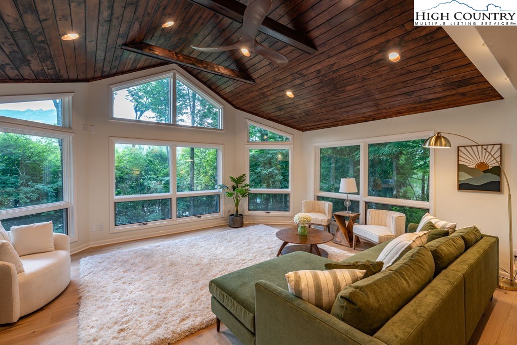 102 Ridge Drive Linville, NC 28646 - Photo 9 of 48 a living room with furniture and a large window