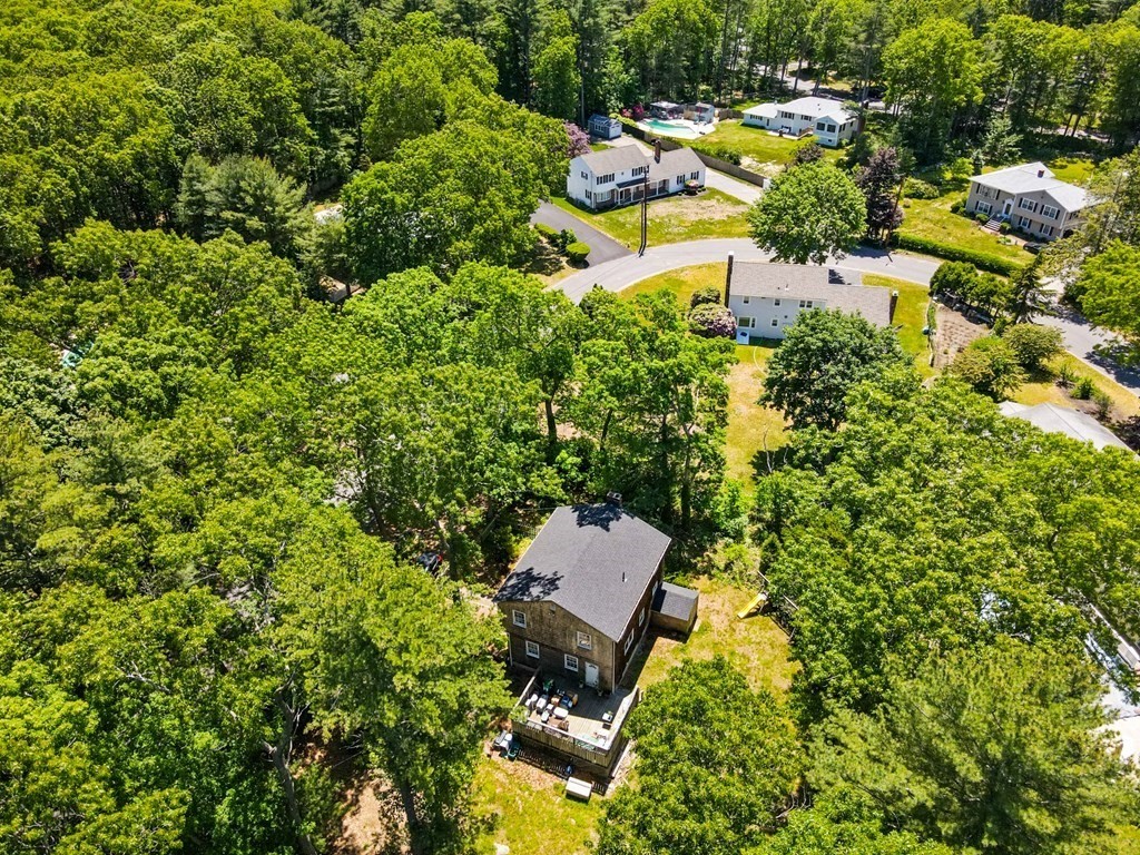 5 Hazelwood Drive Hingham, MA 02043 - Photo 8 of 12 an aerial view of a house with a yard and lake view