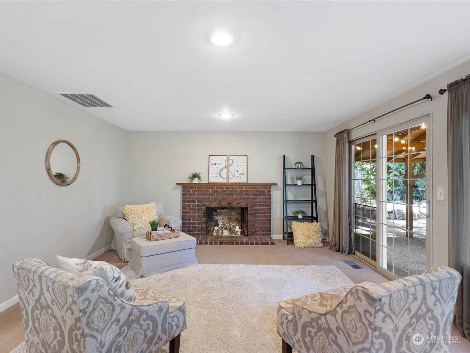 19124 27th Drive Southeast Bothell, WA 98012 - Photo 11 of 35 a bedroom with furniture and a fireplace