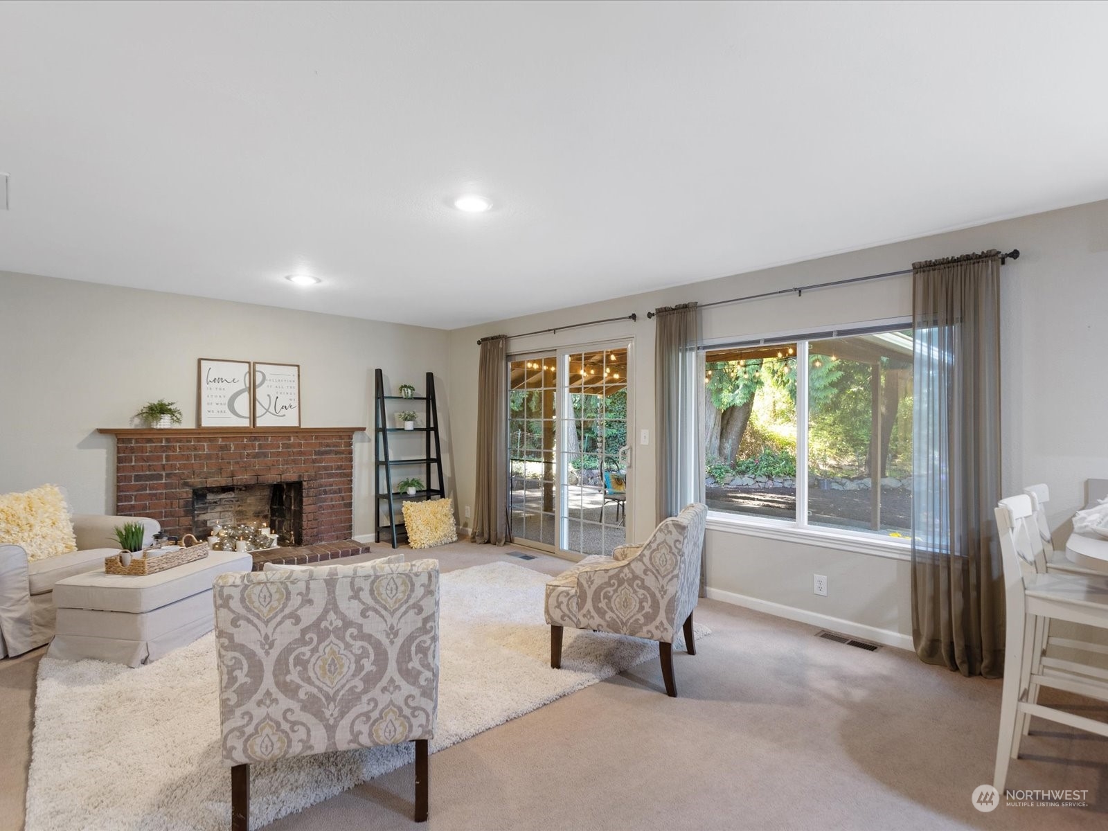 19124 27th Drive Southeast Bothell, WA 98012 - Photo 12 of 35 a living room with furniture and a large window