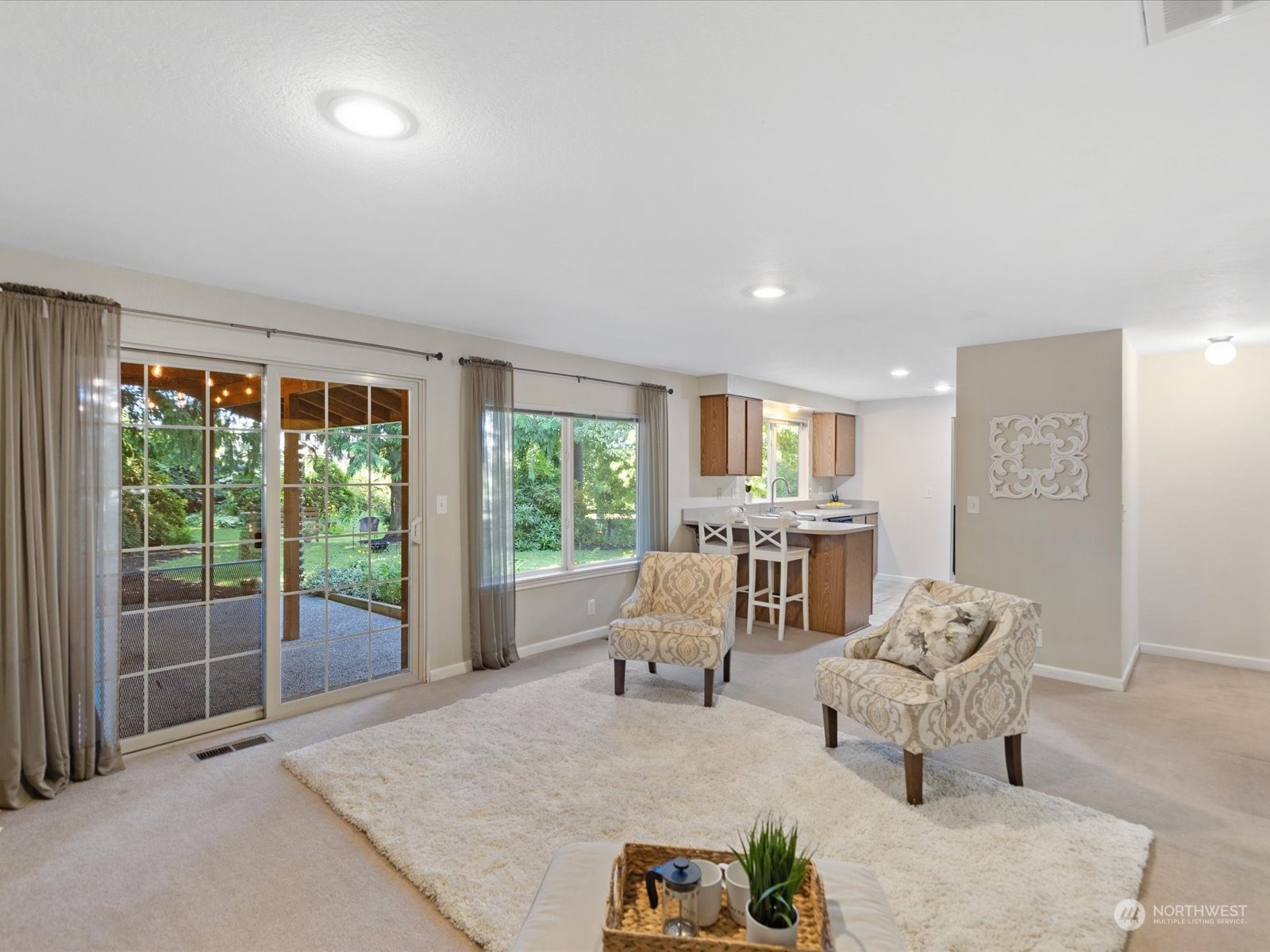 19124 27th Drive Southeast Bothell, WA 98012 - Photo 13 of 35 a living room with furniture and a large window