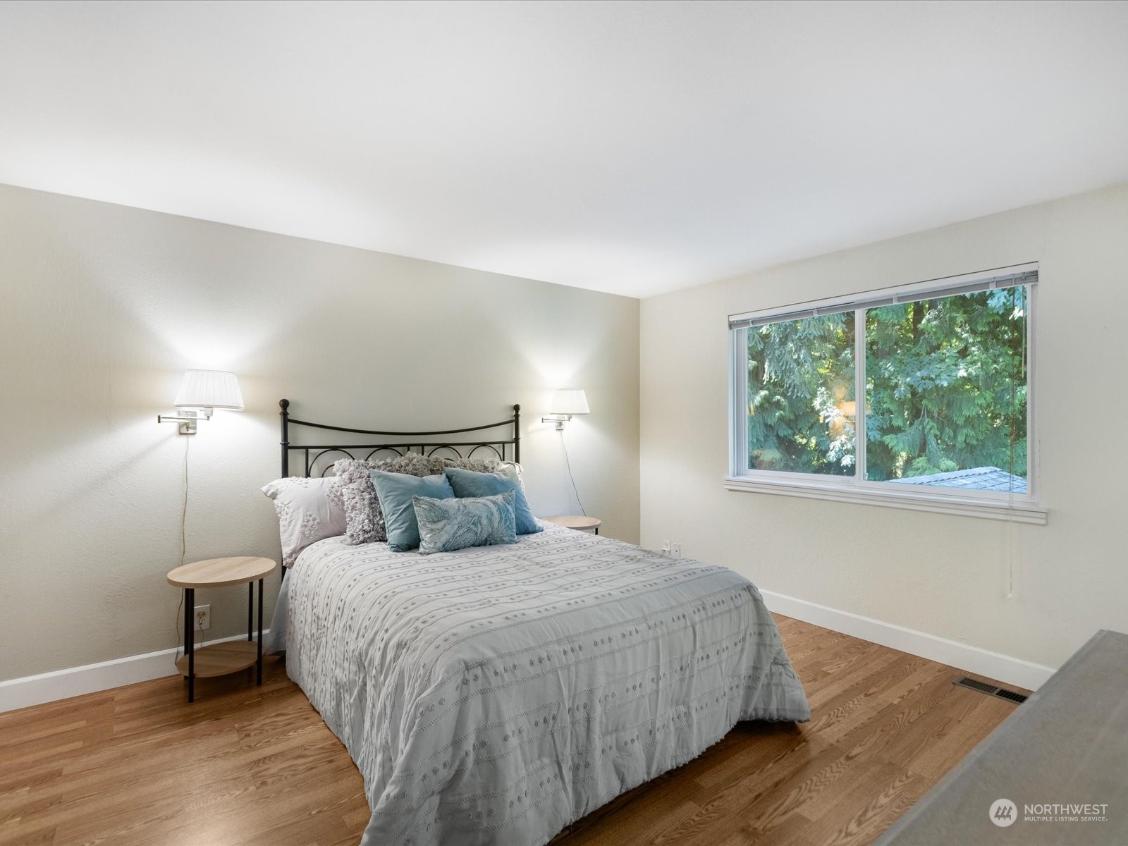 19124 27th Drive Southeast Bothell, WA 98012 - Photo 15 of 35 a bedroom with a bed and a night stand