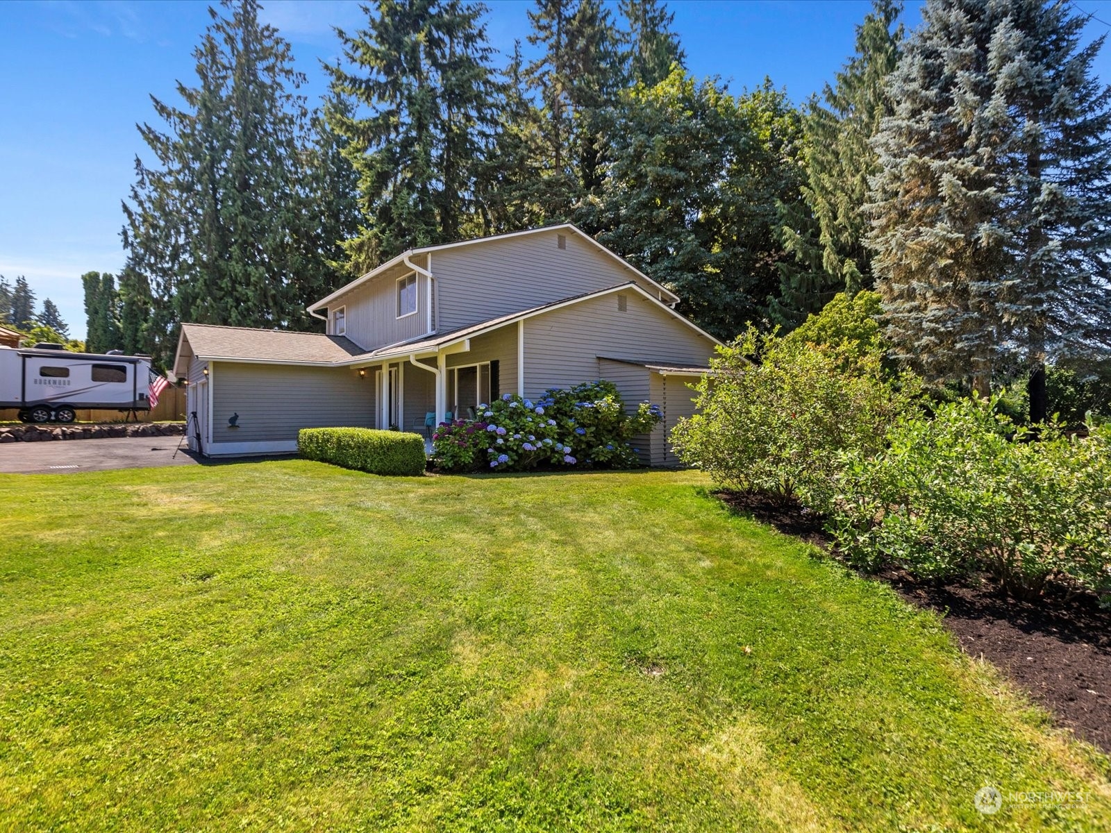 19124 27th Drive Southeast Bothell, WA 98012 - Photo 32 of 35 a house view with a garden space