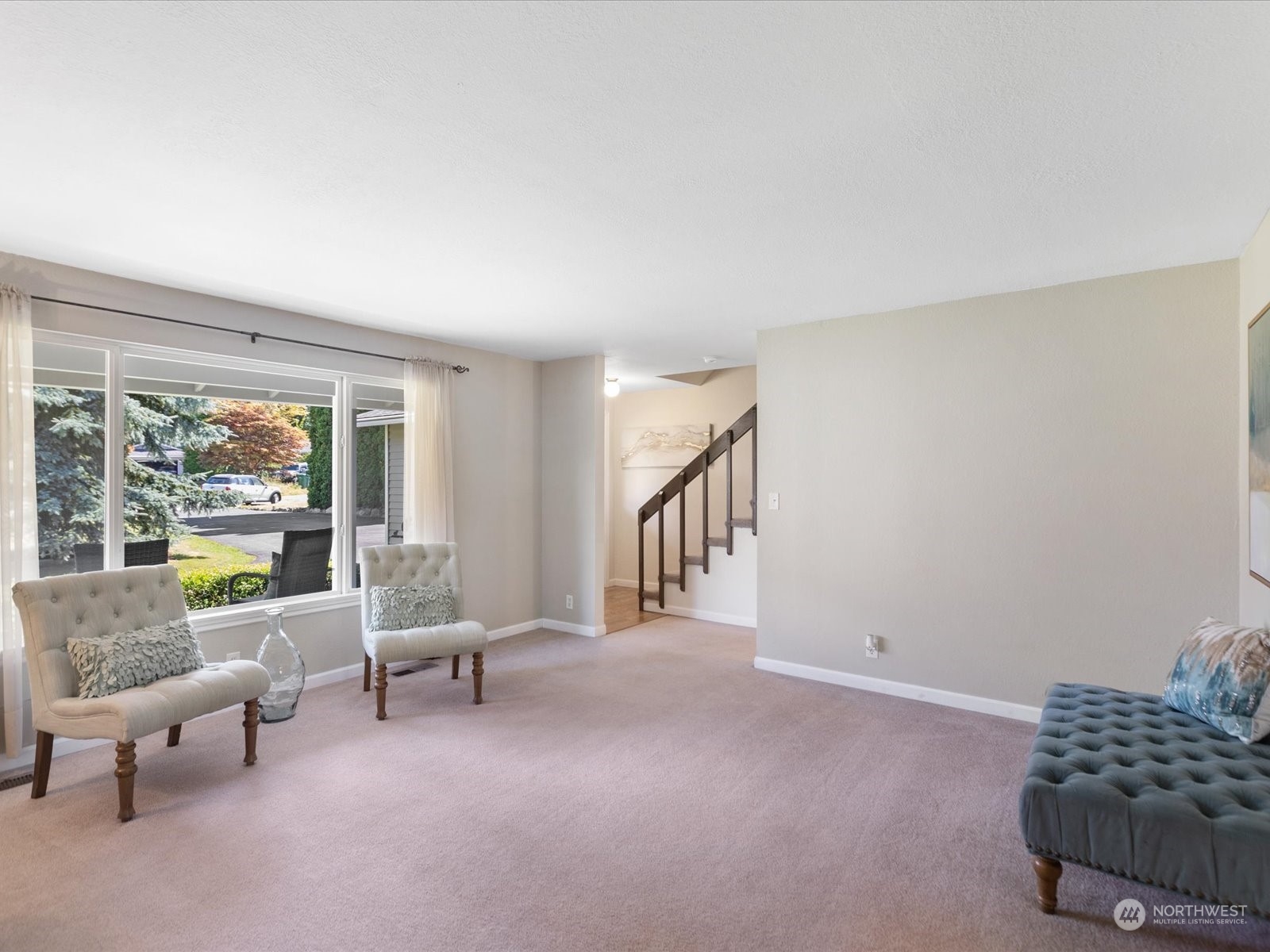 19124 27th Drive Southeast Bothell, WA 98012 - Photo 4 of 35 a living room with furniture and a window