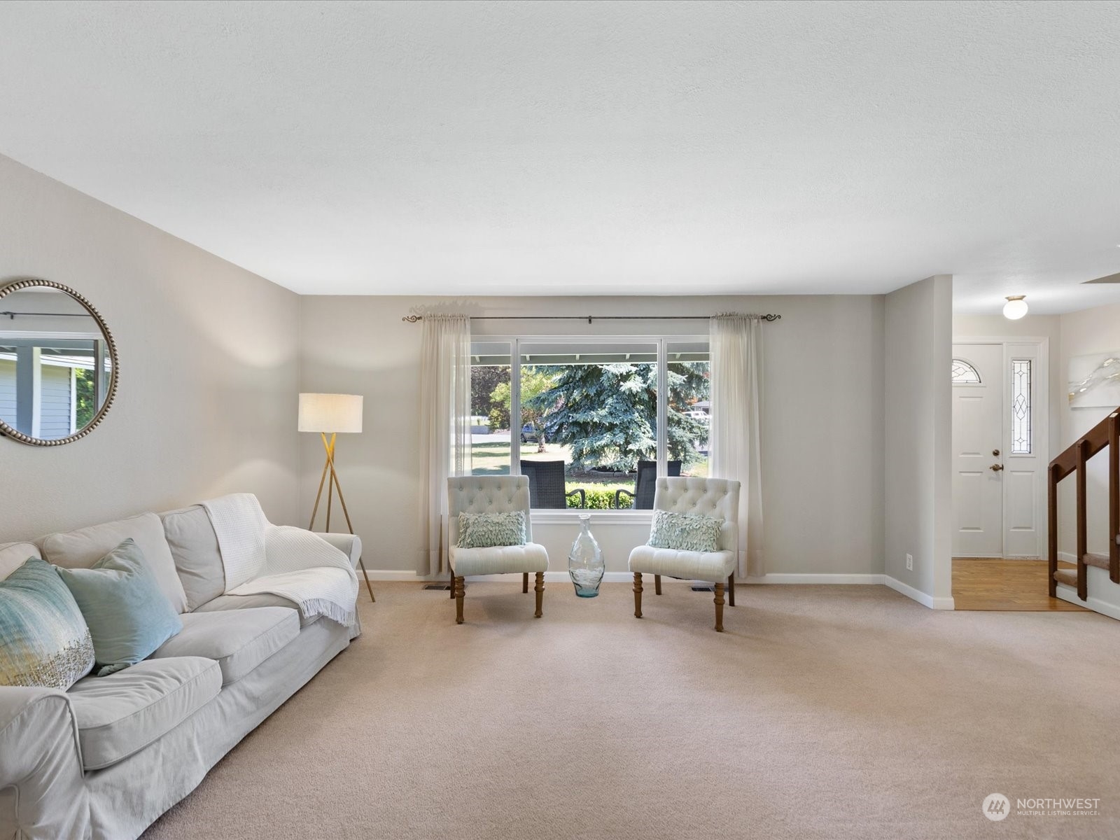 19124 27th Drive Southeast Bothell, WA 98012 - Photo 5 of 35 a living room with furniture and a large window