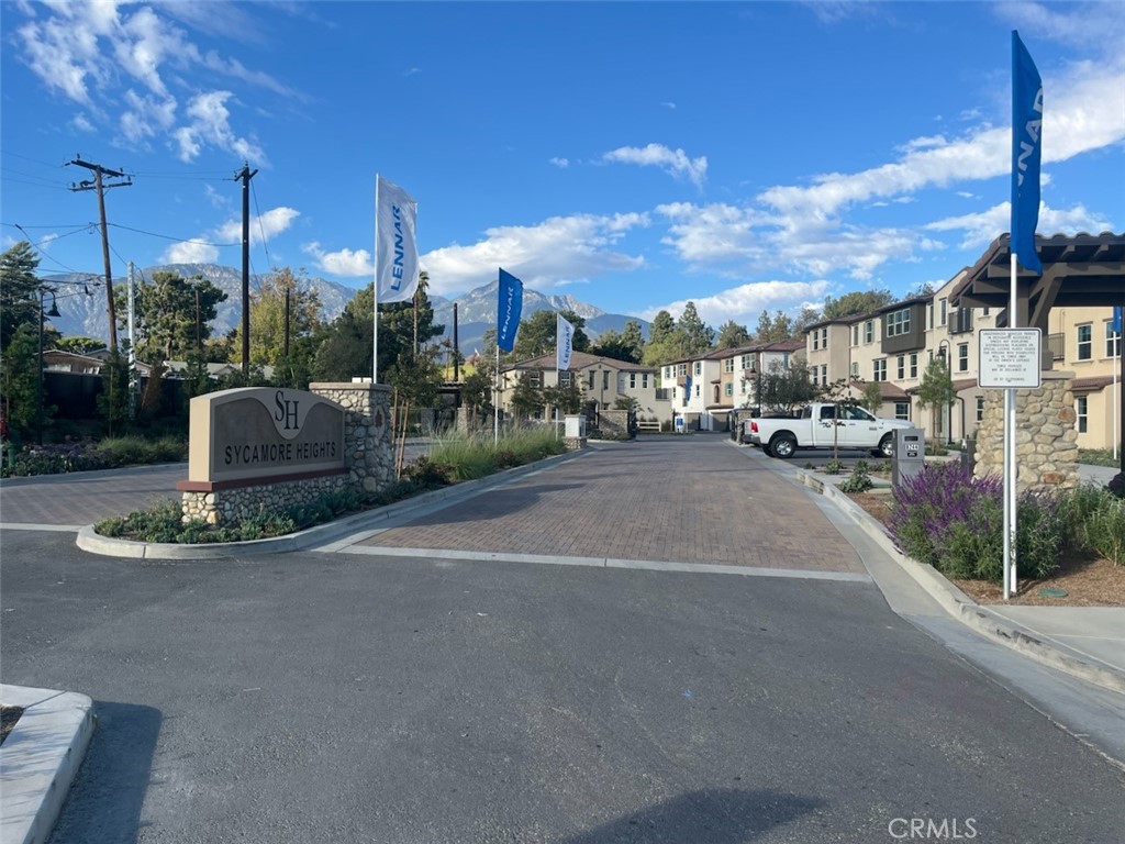 a view of a street with cars