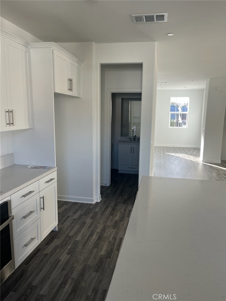 8315 Gabrielino Court Rancho Cucamonga, CA 91730 - Photo 11 of 27 a view of a kitchen from the hallway