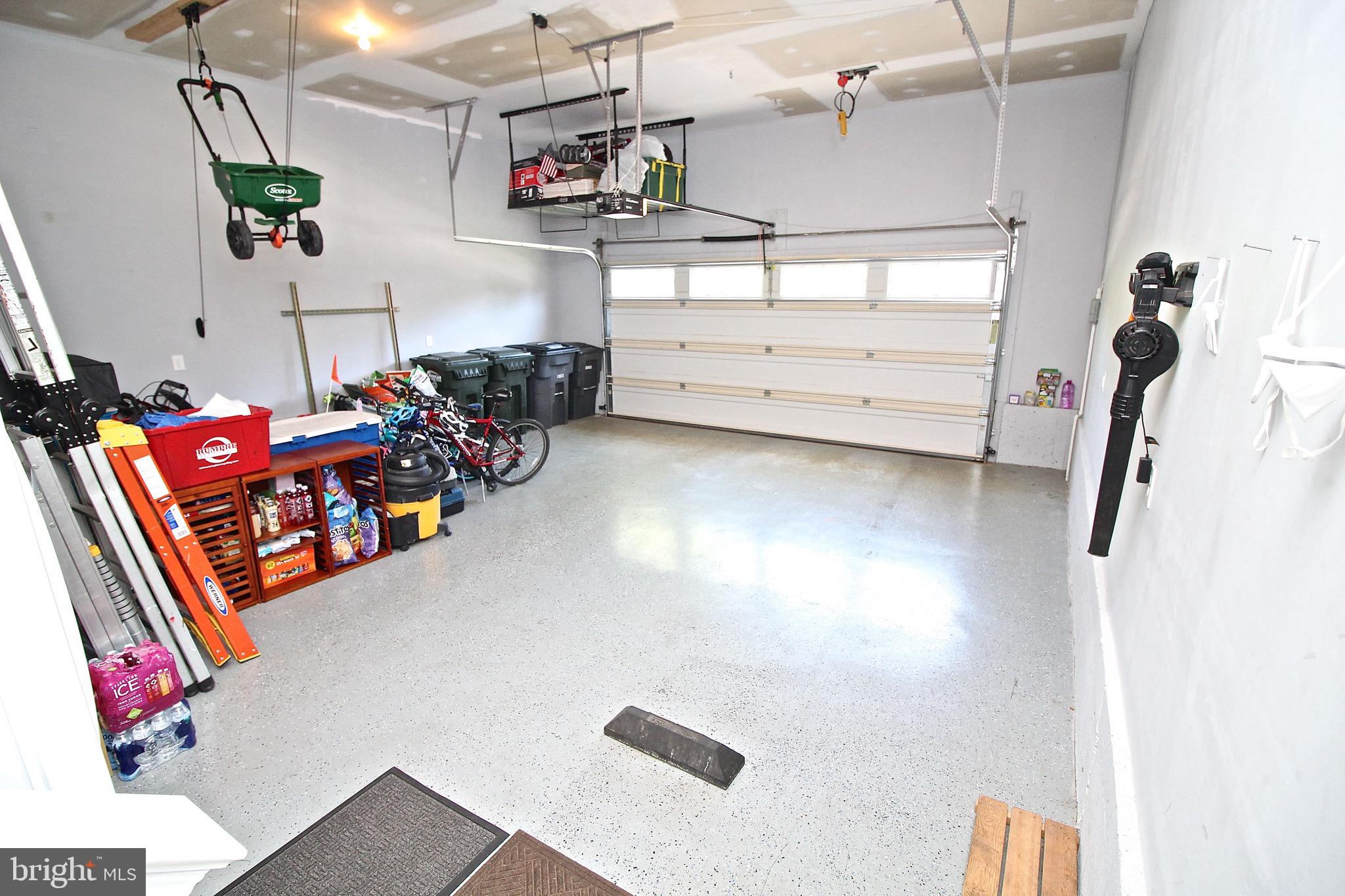 15221 Londons Bridge Road Haymarket, VA 20169 - Photo 22 of 44 Over sized garage with epoxy flooring