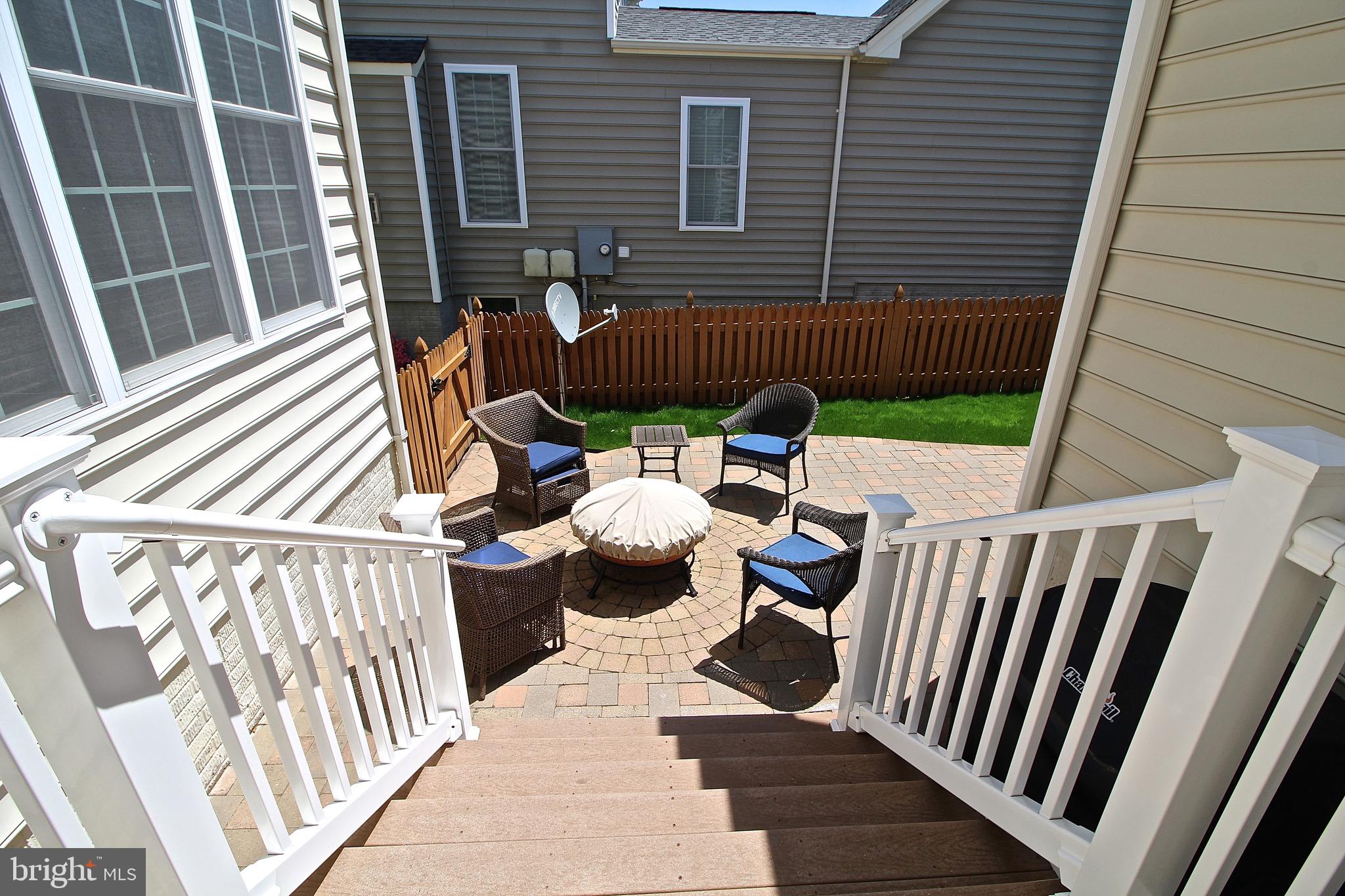 15221 Londons Bridge Road Haymarket, VA 20169 - Photo 6 of 44 Low maintenance step down to patio with lighting