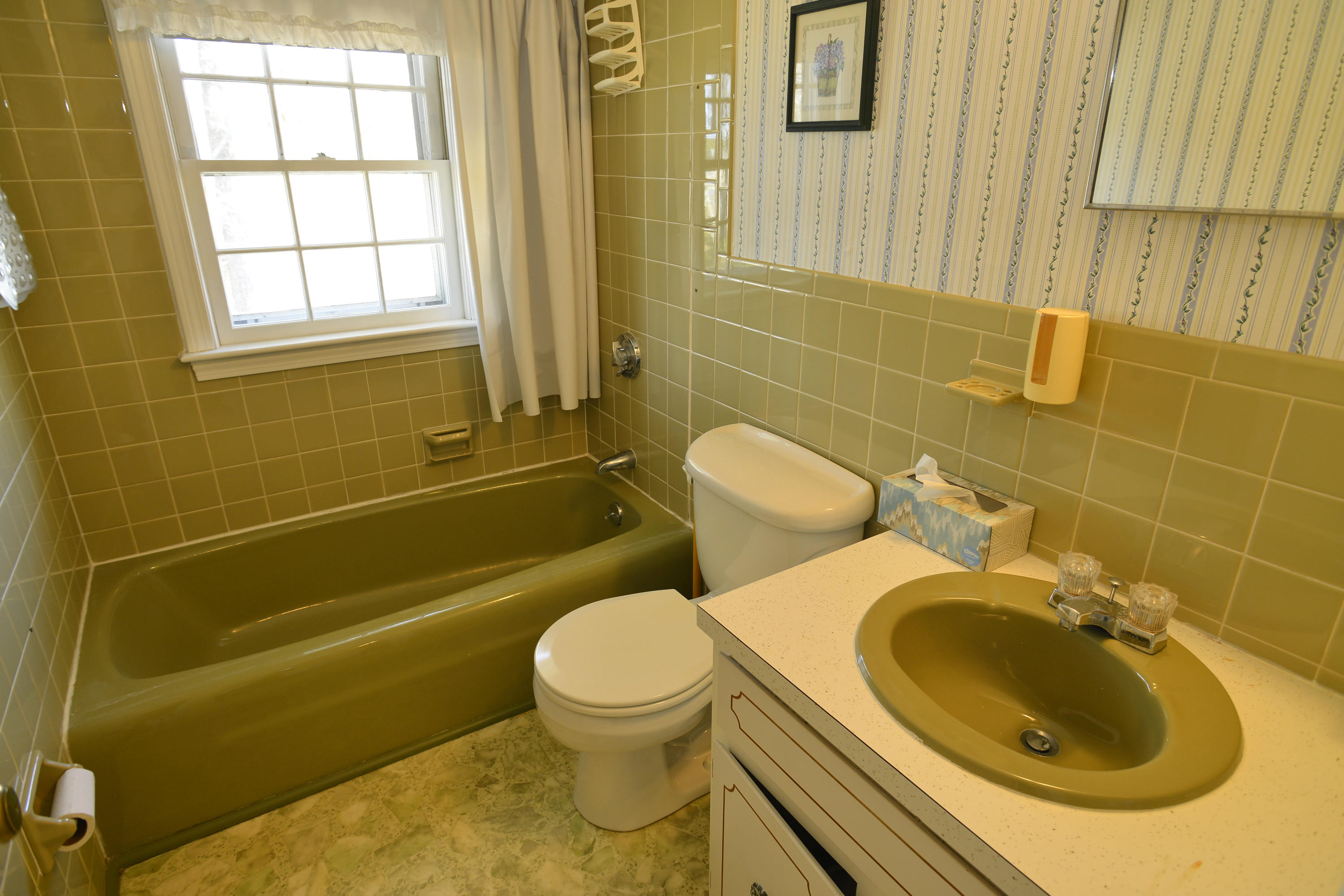 26 Lower County Road Dennis Port, MA 02639 - Photo 24 of 32 a bathroom with a sink a toilet and shower