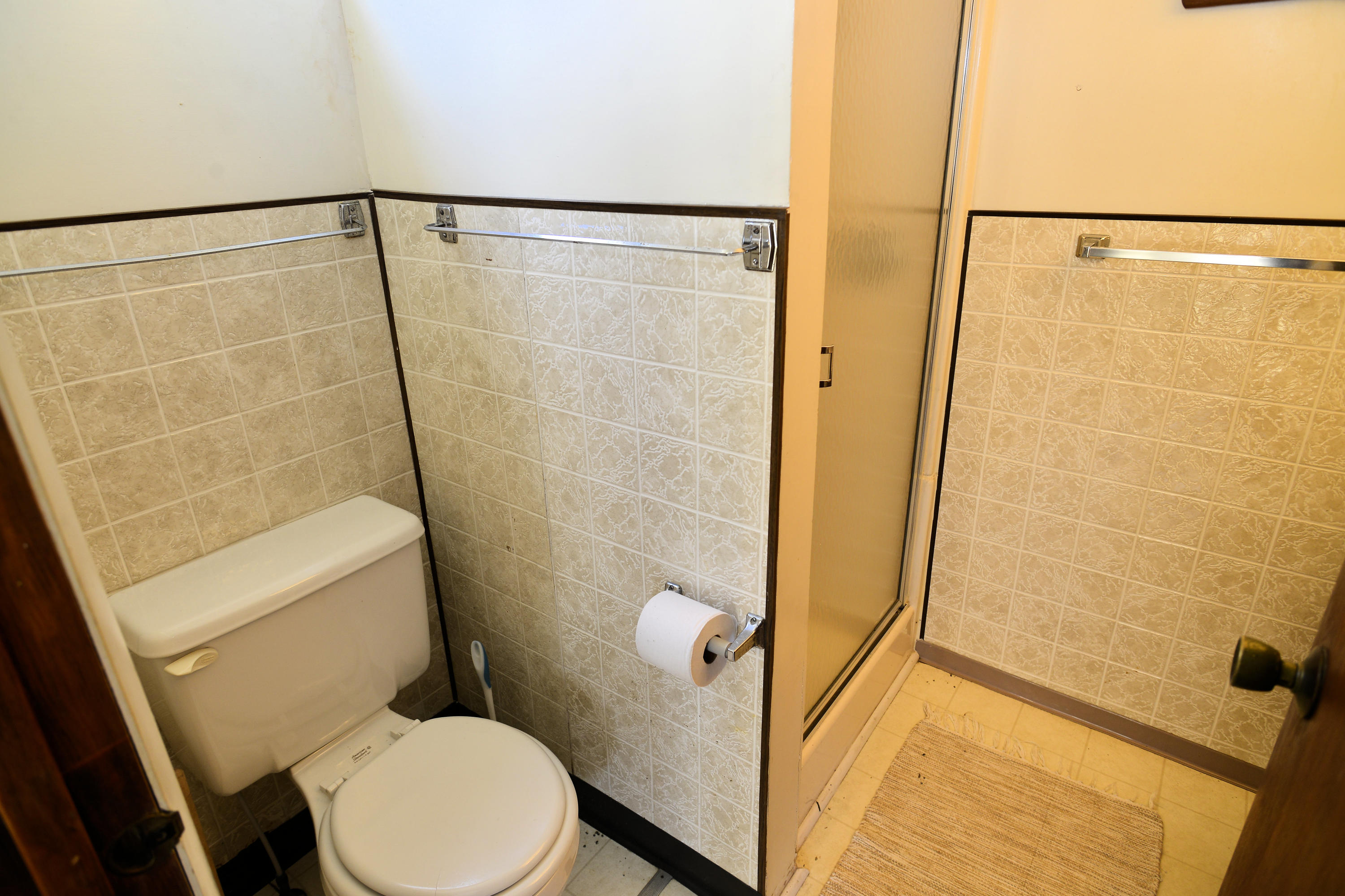 26 Lower County Road Dennis Port, MA 02639 - Photo 30 of 32 a bathroom with a shower and a toilet