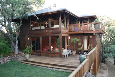 195 Crest Road Novato, CA 94945 - Photo 12 of 12 a front view of house with a garden and plants