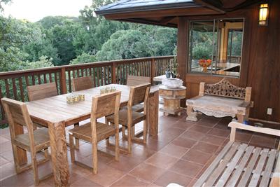 195 Crest Road Novato, CA 94945 - Photo 6 of 12 a view of a patio with a dining table and chairs with wooden floor