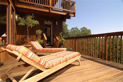 195 Crest Road Novato, CA 94945 - Photo 9 of 12 a bed sitting in a balcony with wooden floor