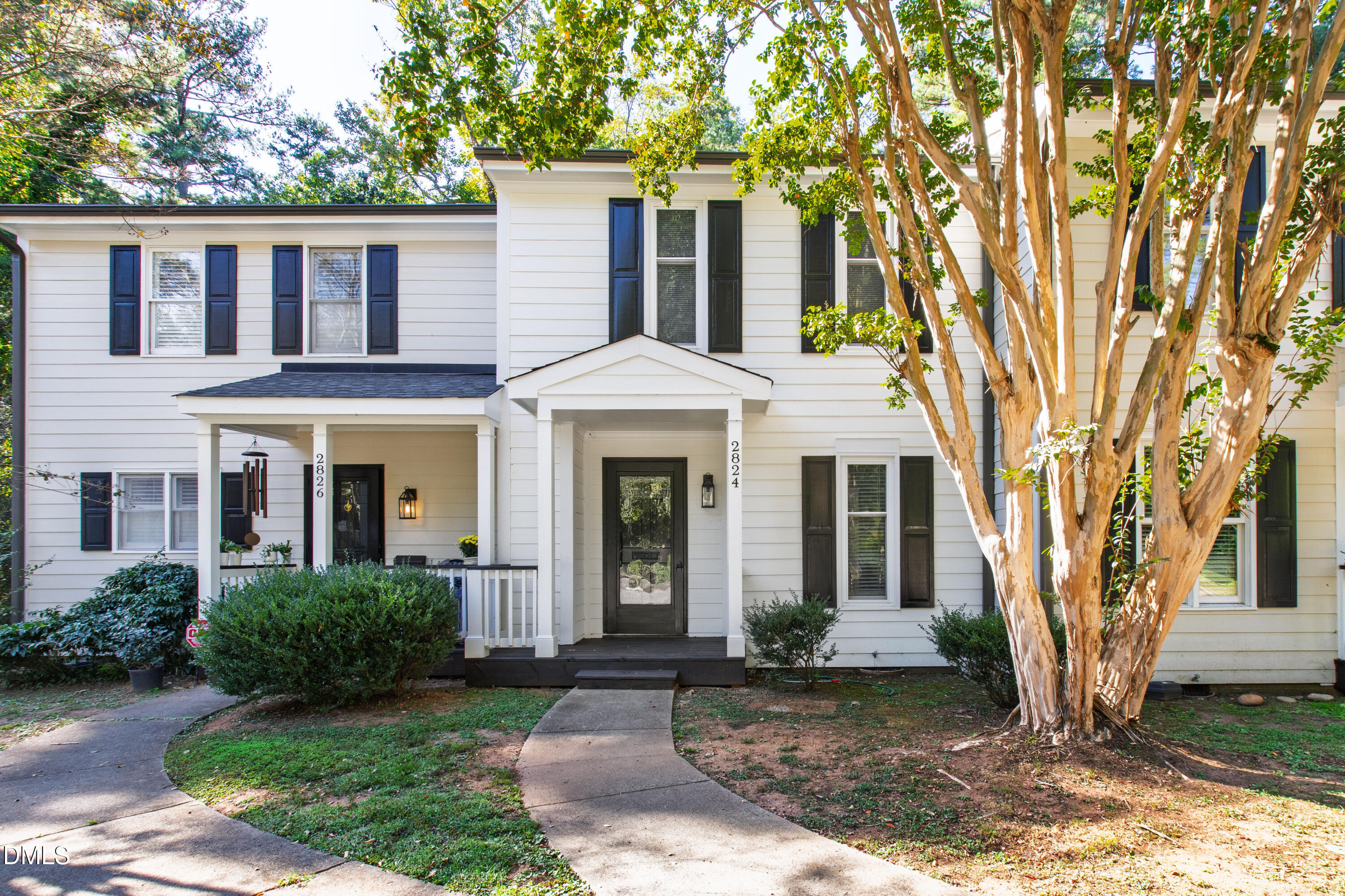 2824 Wayland Drive Raleigh, NC 27608 - Photo 1 of 31 a front view of a house with garden
