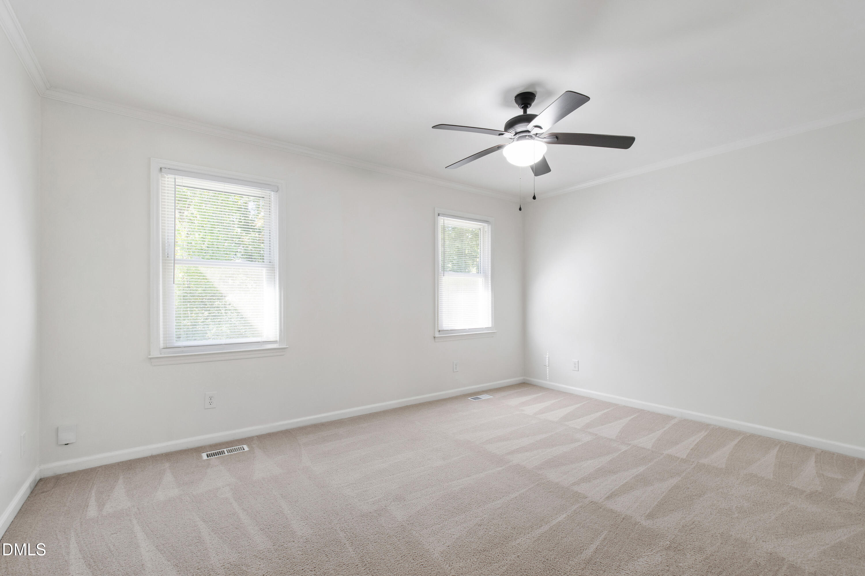 2824 Wayland Drive Raleigh, NC 27608 - Photo 20 of 31 a view of an empty room with a window