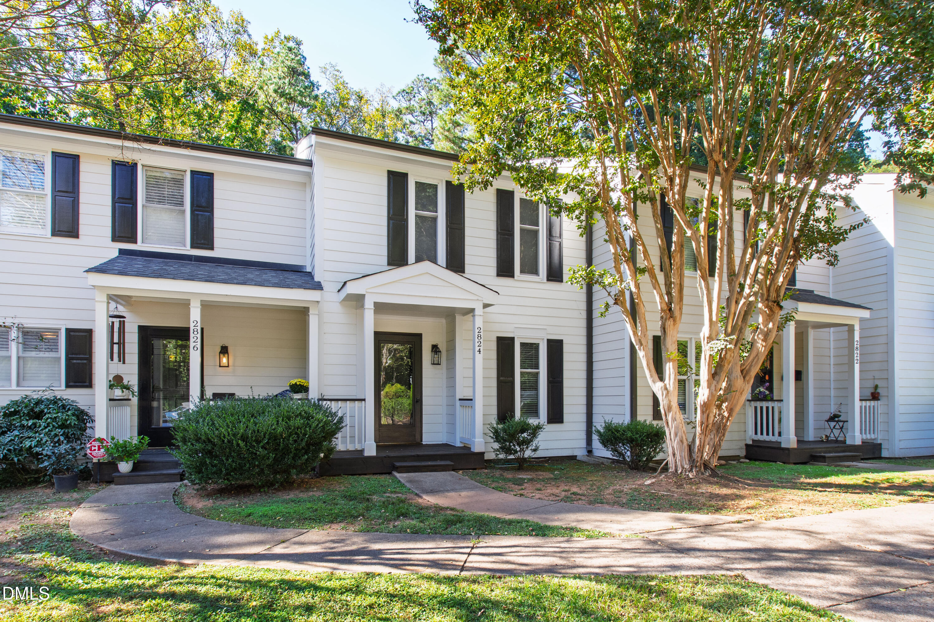2824 Wayland Drive Raleigh, NC 27608 - Photo 3 of 31 a view of a yard in front of a house