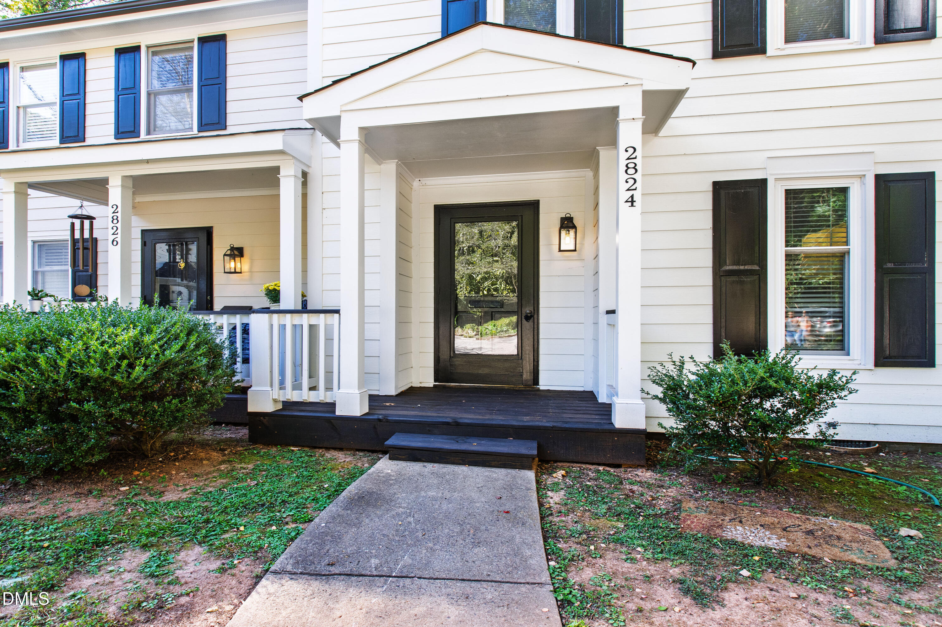 2824 Wayland Drive Raleigh, NC 27608 - Photo 4 of 31 front view of a house with a yard
