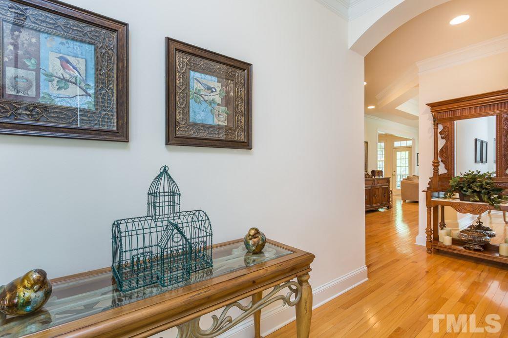 7260 Summit Waters Lane Raleigh, NC 27613 - Photo 4 of 23 a view of living room and workspace