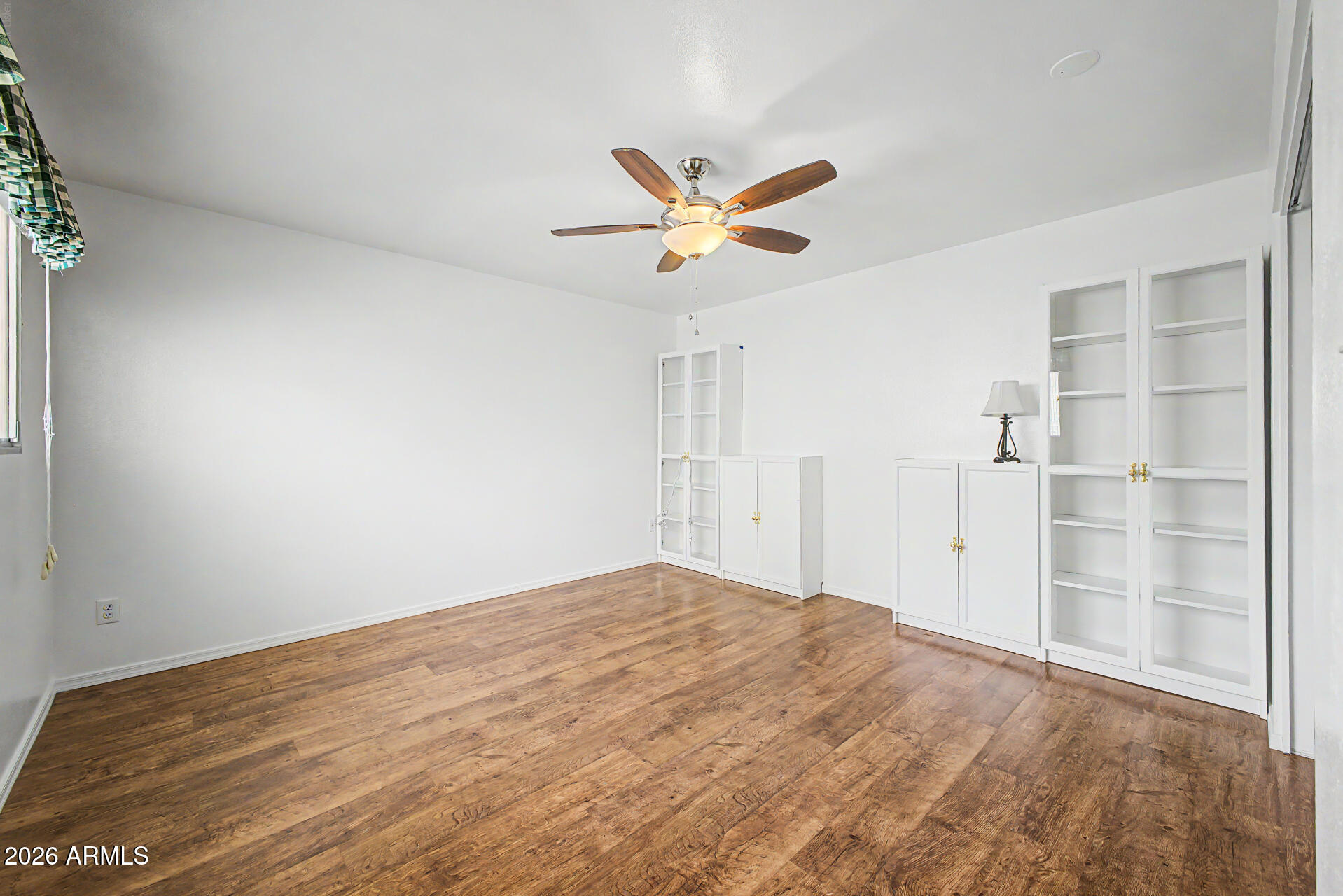 5873 East Thomas Road Scottsdale, AZ 85251 - Photo 18 of 30 wooden floor in an empty room