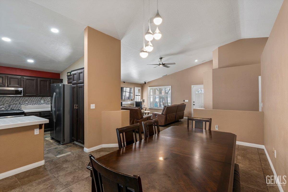 Undisclosed Address Bakersfield, CA 93312 - Photo 22 of 31 a view of a dining room with furniture