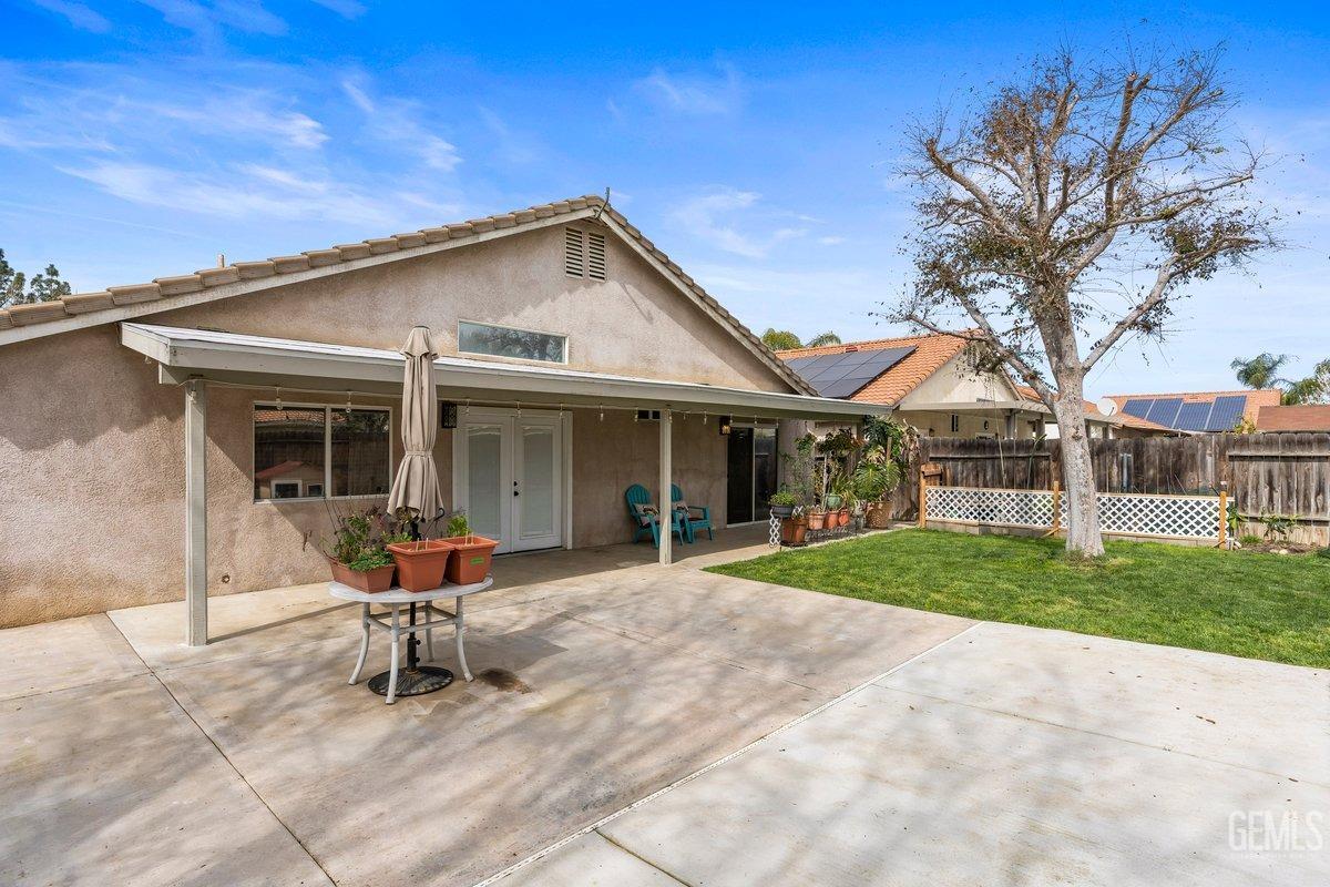 Undisclosed Address Bakersfield, CA 93312 - Photo 30 of 31 a view of a house with backyard and a garden