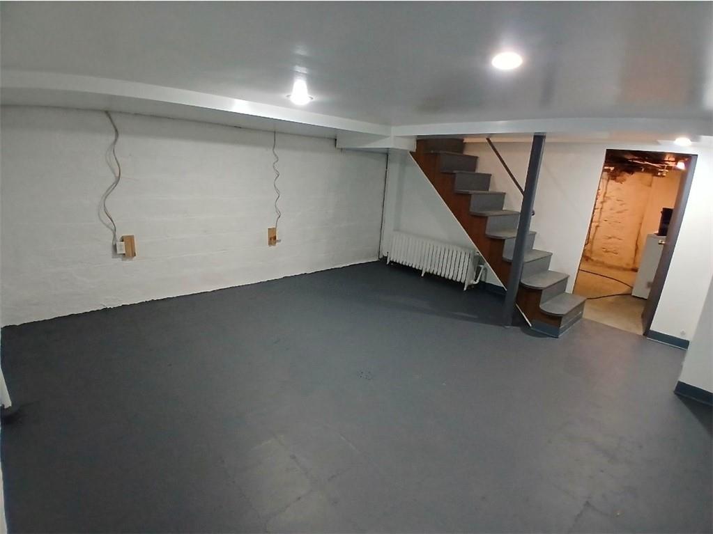 231 Rinne Street Pittsburgh, PA 15210 - Photo 15 of 24 a view of a storage & utility room with stairs