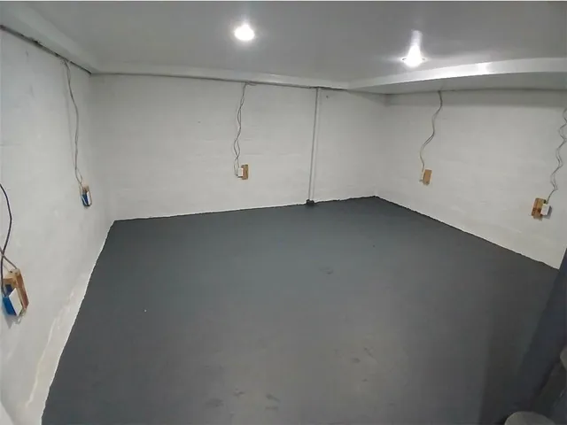 a view of a room with racks on the wall